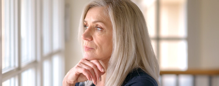 Life Assure Senior Woman Looking Thoughtful Hero
